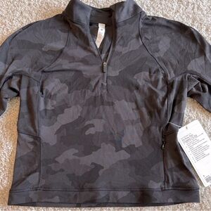 Lulu lemon, never worn with tags. Size 8 Rulu Run Cropped 1/2 zip